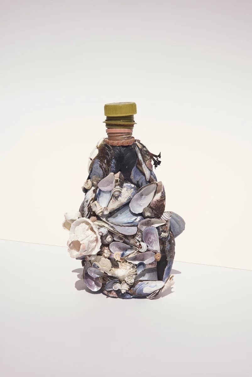 Bottle filled with collected plastic. From Plastic Ocean by Thirza Schaap.