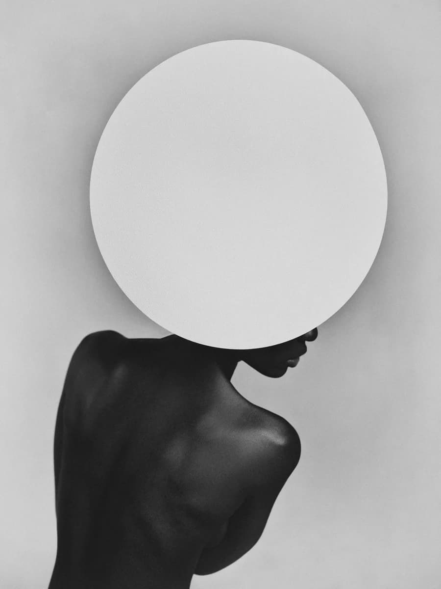 Portrait with a circular headpiece. From Rhythm by Bastiaan Woudt.